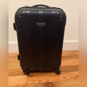Kenneth Cole carry on roller suitcase. Navy. 21” high, 9” deep